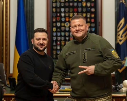 Volodymyr Zelenskyy, and Valerii Zaluzhnyi shake hands during their meeting in Kyiv in February 2024.
