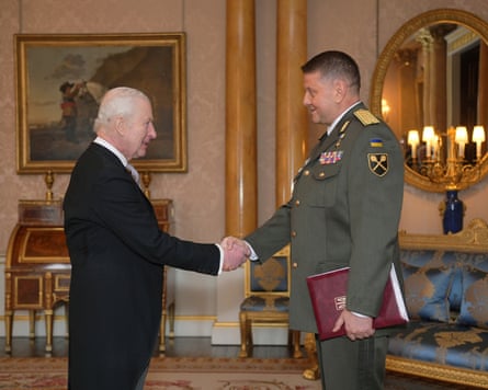Zaluzhnyi shaking hands with Charles