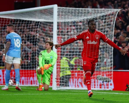Arnaud Kalimuendo celebrates scoring a goal.