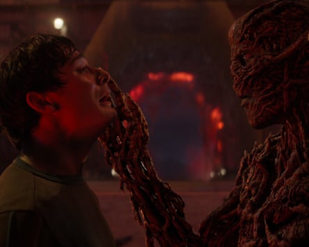 Noah Schnapp as Will looking afraid and Jamie Campbell Bower as Vecna in heavy prosthetics