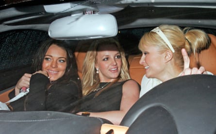 From left, Lindsay Lohan, Britney Spears and Paris Hilton in the front of a car, November 26, 2006 in Los Angeles, California