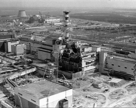 An aerial view in black and white of the Chornobyl nuclear plant shows the damage from the explosion on 26 April 1986.