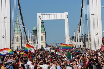 Crowds cross the Elisabeth Bridge during the Budapest Pride march.