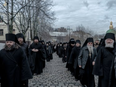 Priests on black gathered at Pechersk Lavra