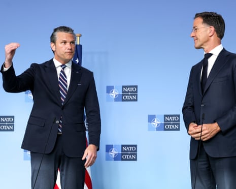 United States Secretary of War Pete Hegseth (L) gives a statement as secretary general of Nato Mark Rutte (R) looks on prior to a Nato Defence Ministers meeting in Brussels, Belgium.