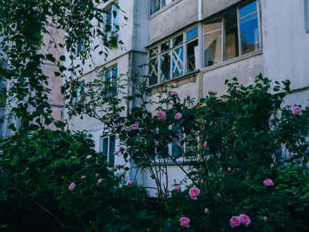 A building with damaged windows after the attack