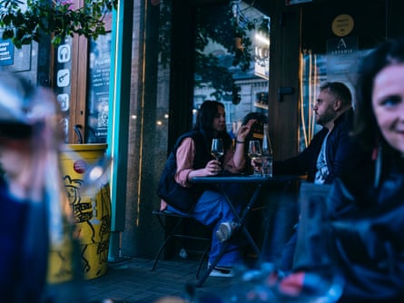 People drinking in a wine bar