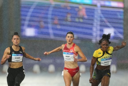Zoe Hobbs, of New Zealand, Amy Hunt, of England, and Jonielle Smith, of Jamaica, compete in women’s 100 meters semi-final at the Commonwealth Games in Glasgow, Scotland.