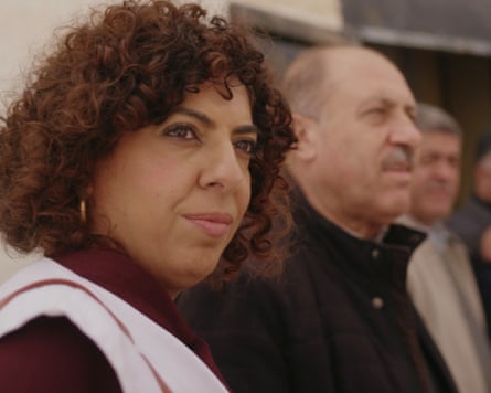 Dr Lina Qasem-Hassan, a Palestinian doctor in Israel’s healthcare system, in the documentary, The Oath, looking thoughfully in the distance