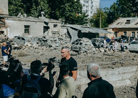 Vitali Klitschko, Kyiv’s city mayor, talks to the media at the site of a direct hit