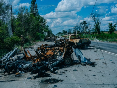 Gutted and mangled vehicles.