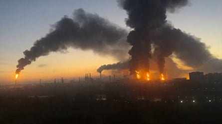A refinery burning in the distance in Moscow 