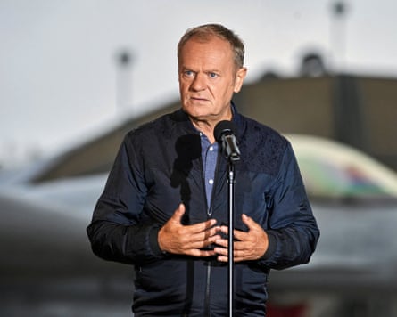 Donald Tusk speaks during a press conference at Lask airbase in Poland about the threat posed by Russian drones in Polish airspace.